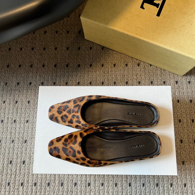 THE ROW 26S SQUARE TOE BACKLESS SLIDES IN BROWN SPOTTED CALF HAIR