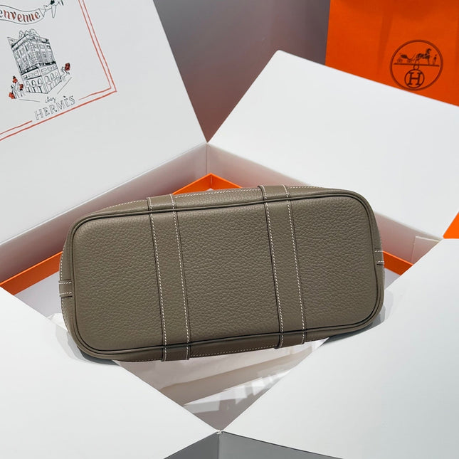 GARDEN PARTY 30CM IN BROWN TOILETS COTTON CANVAS AND TOGO ETOUPE CALFSKIN