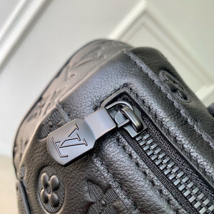 GETAWAY BACKPACK 50 IN BLACK MONOGRAM ECLIPSE CANVAS AND CALFSKIN EMBOSSED LOGO