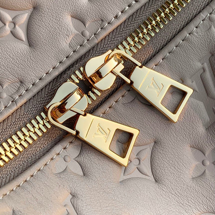 COUSSIN MM 38 IN BEIGE MONOGRAM EMBOSSED CALFSKIN GOLD HARDWARE