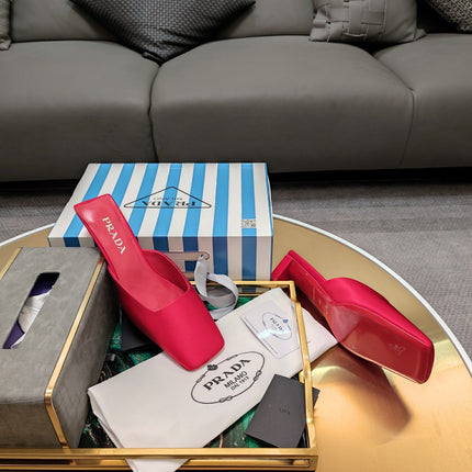 PRADA 26S SQUARE TOE MULES 40MM IN DARK RED SATIN