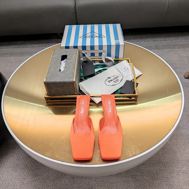 PRADA 26S SQUARE TOE MULES 40MM IN ORANGE SATIN