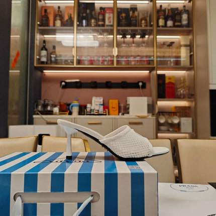 PRADA 26S MULE SANDALS 75MM IN WHITE CALFSKIN AND MESH GOLD HARDWARE