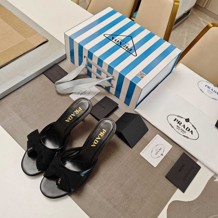 PRADA 26S HEEL MULE SANDALS 75MM IN BLACK CALFSKIN WITH BOW