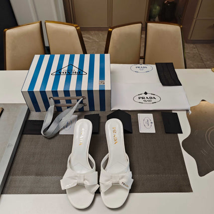 PRADA 26S HEEL MULE SANDALS 75MM IN WHITE CALFSKIN WITH BOW