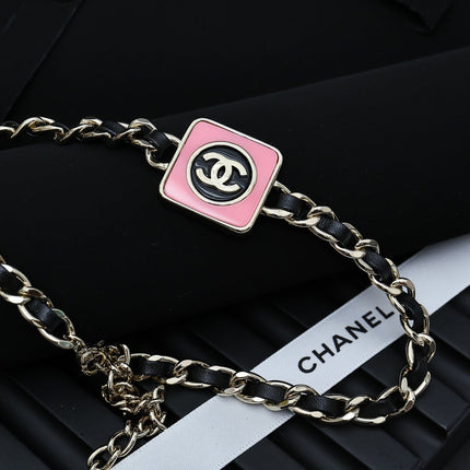 CHAIN CHOKER IN GOLD-PLATED METAL WITH  LEATHER THROUGH LINKS