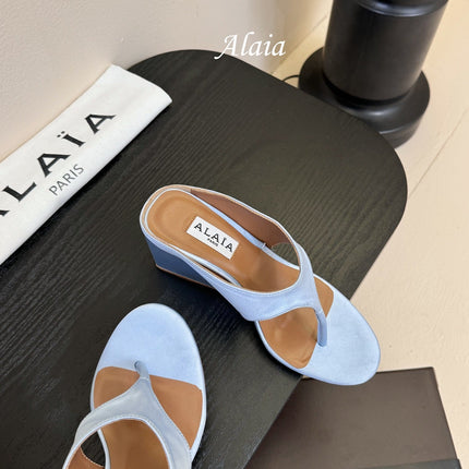 ALAIA WEDGE THONG SANDALS 25S IN BLUE SATIN