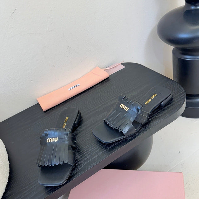 MIUMIU 26S FLAT SLIPPERS IN BLACK CALFSKIN