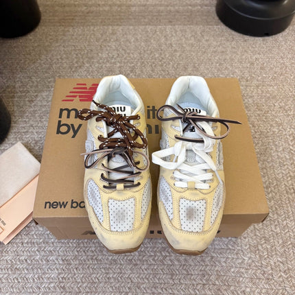 MIUMIU 26S PERFORATED SNEAKERS IN WHITE AND BEIGE YELLOW CALFSKIN