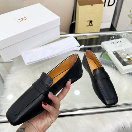 THE ROW 26S PENNY LOAFER FLATS IN BLACK GRAINED CALFSKIN