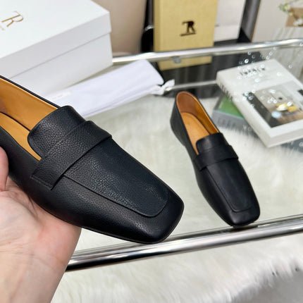 THE ROW 26S PENNY LOAFER FLATS IN BLACK GRAINED CALFSKIN