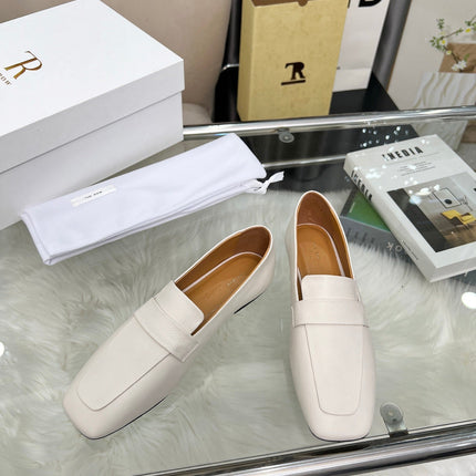THE ROW 26S PENNY LOAFER FLATS IN IVORY WHITE GRAINED CALFSKIN