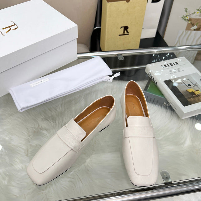 THE ROW 26S PENNY LOAFER FLATS IN IVORY WHITE GRAINED CALFSKIN