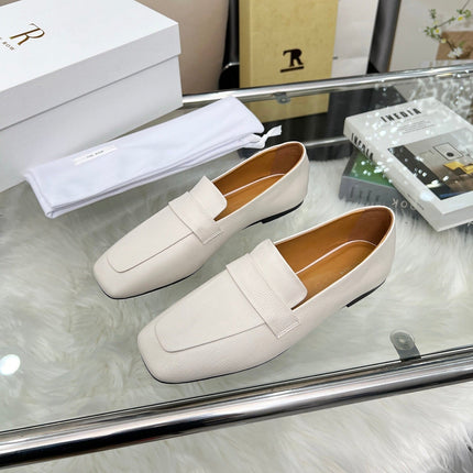 THE ROW 26S PENNY LOAFER FLATS IN IVORY WHITE GRAINED CALFSKIN