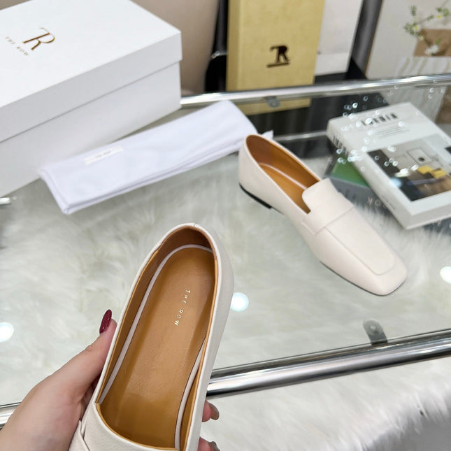 THE ROW 26S PENNY LOAFER FLATS IN IVORY WHITE GRAINED CALFSKIN