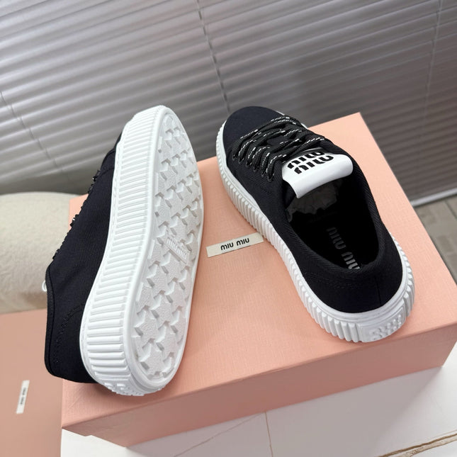 MIUMIU 26S PLATFORM SNEAKERS IN BLACK CANVAS