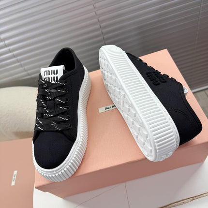 MIUMIU 26S PLATFORM SNEAKERS IN BLACK CANVAS