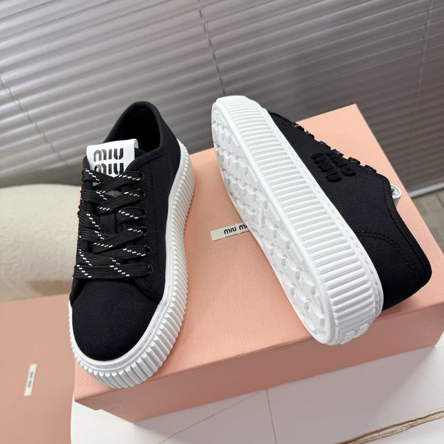 MIUMIU 26S PLATFORM SNEAKERS IN BLACK CANVAS