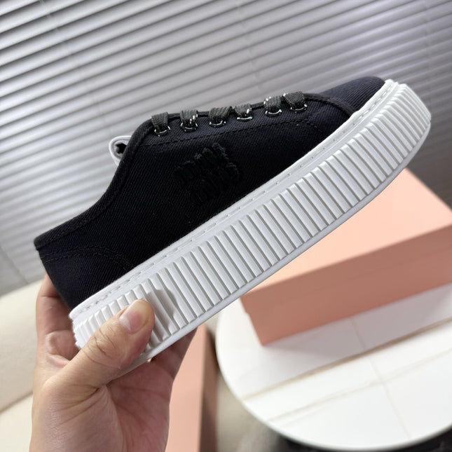 MIUMIU 26S PLATFORM SNEAKERS IN BLACK CANVAS