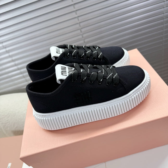 MIUMIU 26S PLATFORM SNEAKERS IN BLACK CANVAS