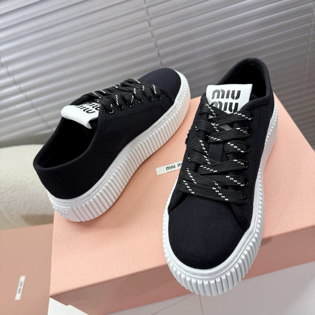 MIUMIU 26S PLATFORM SNEAKERS IN BLACK CANVAS