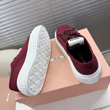 MIUMIU 26S PLATFORM SNEAKERS IN DARK RED CANVAS