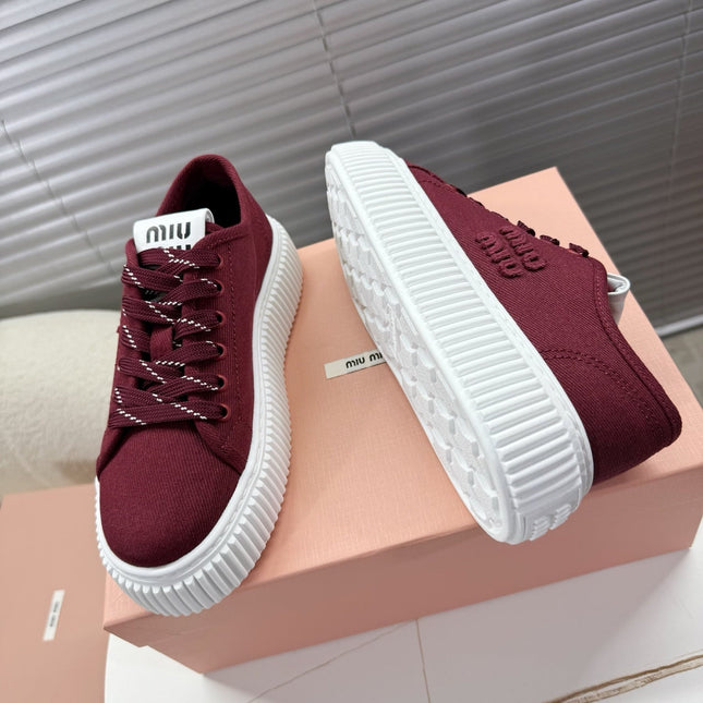 MIUMIU 26S PLATFORM SNEAKERS IN DARK RED CANVAS