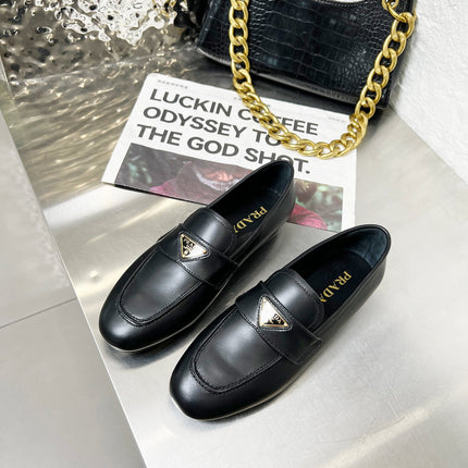 PRADA 26S CLASSIC LOAFERS IN BLACK CALFSKIN WITH LOGO