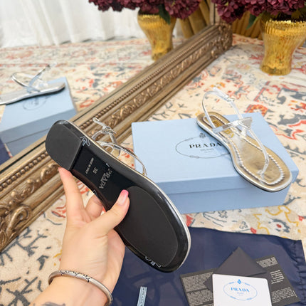 PRADA 26S THONG SANDALS IN SILVER CALFSKIN TRIANGLE LOGO