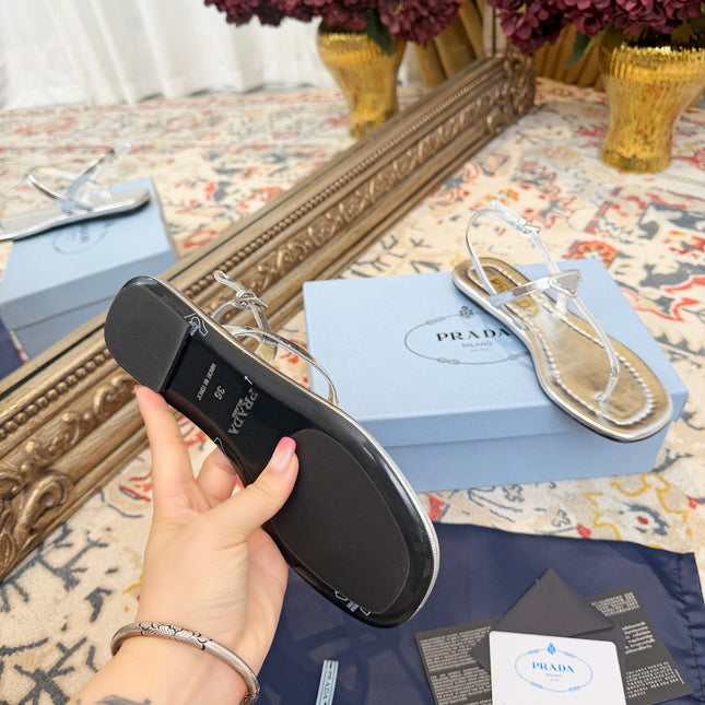 PRADA 26S THONG SANDALS IN SILVER CALFSKIN TRIANGLE LOGO