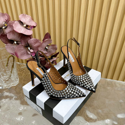 AQUAZZURA 26S SLINGBACK PUMPS 105 MM IN BLACK CALFSKIN WITH CRYSTAL