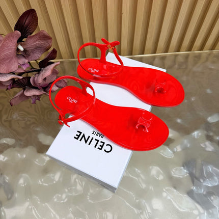 CELINE 26S TRIOMPHE JELLY THONG SANDALS IN BRIGHT RED TPU GOLD HARDWARE