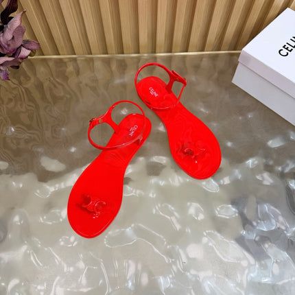CELINE 26S TRIOMPHE JELLY THONG SANDALS IN BRIGHT RED TPU GOLD HARDWARE
