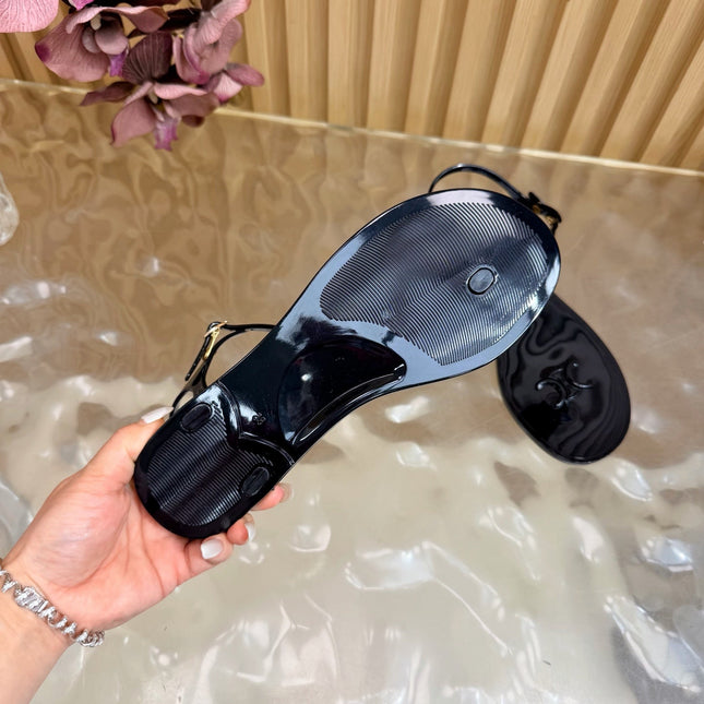 CELINE 26S TRIOMPHE JELLY THONG SANDALS IN BLACK TPU GOLD HARDWARE