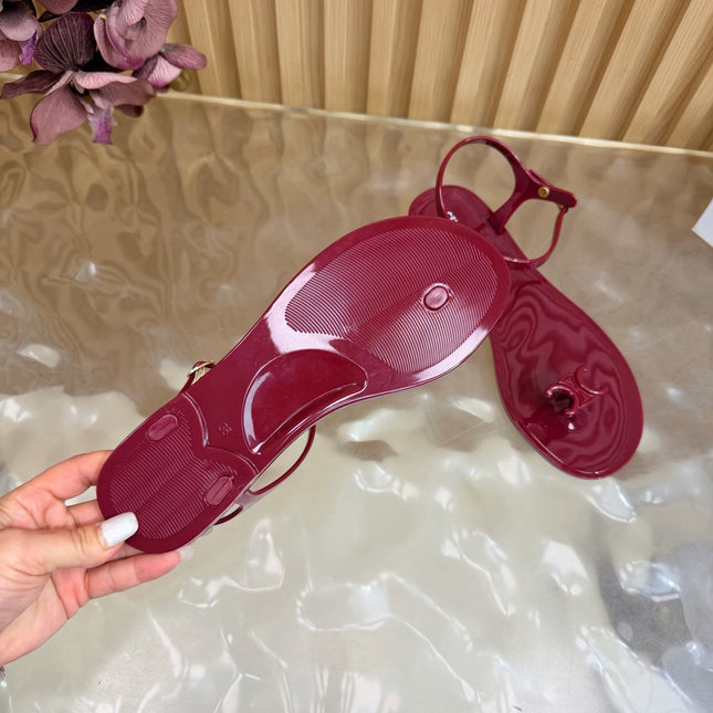 CELINE 26S TRIOMPHE JELLY THONG SANDALS IN BURGUNDY RED TPU GOLD HARDWARE