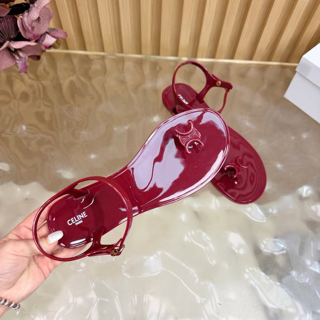 CELINE 26S TRIOMPHE JELLY THONG SANDALS IN BURGUNDY RED TPU GOLD HARDWARE