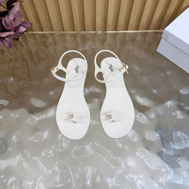 CELINE 26S TRIOMPHE JELLY THONG SANDALS IN WHITE TPU GOLD HARDWARE
