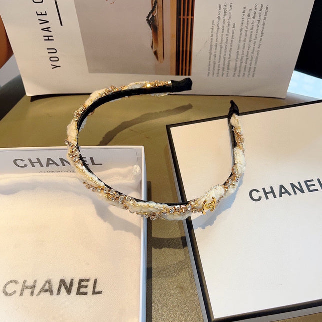 WHITE FABRIC WITH CRYSTAL HAIRBAND 417311