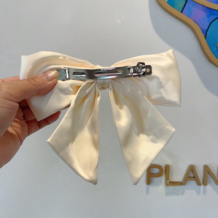DIOR 26S BOW HAIR CLIP IN WHITE SILK 500721