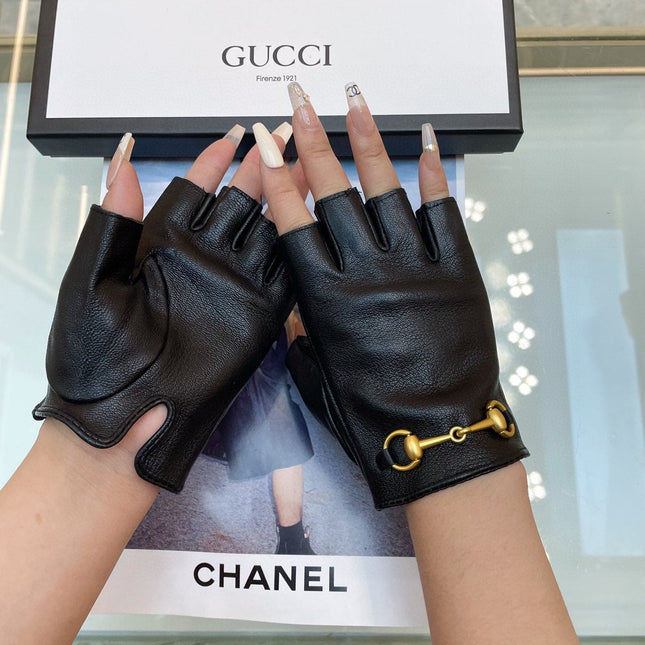 FINGERLESS GLOVES IN BLACK LAMBSKIN WITH GOLD HORSEBIT 432606