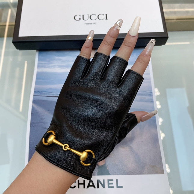 FINGERLESS GLOVES IN BLACK LAMBSKIN WITH GOLD HORSEBIT 432606