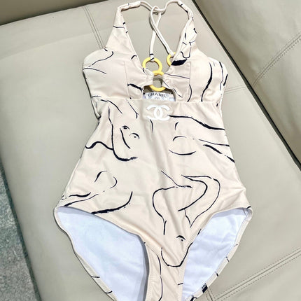 CC BIKINI SWIMSUIT SET IN CREAMY WHITE MIXED WITH CURVED BLACK DETAIL 608919