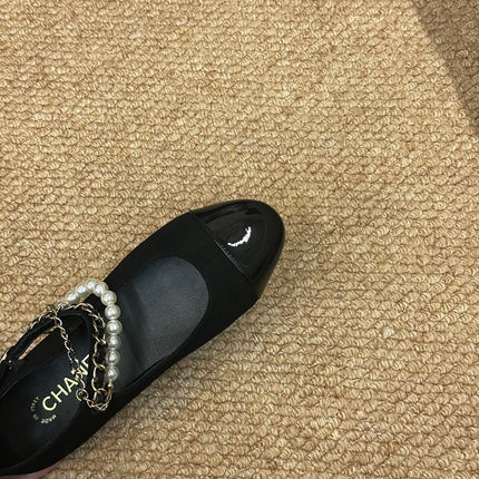 CHANEL 26S MARY JANE PEARL STRAP FLATS IN BLACK CALFSKIN