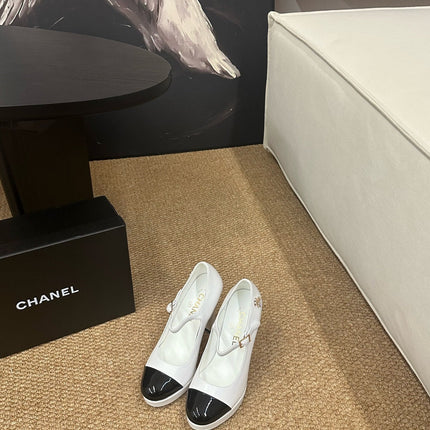 CHANEL 26S MARY JANE HEELS IN WHITE CALFSKIN WITH BLACK CAP TOE