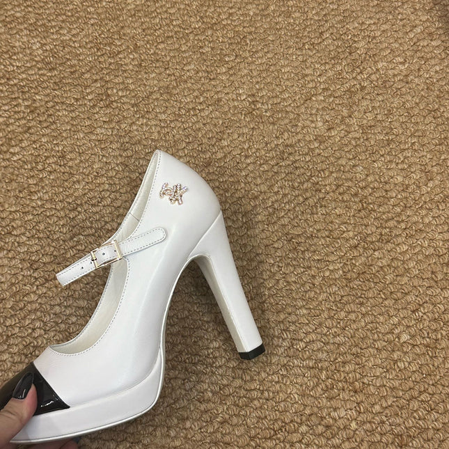 CHANEL 26S MARY JANE HEELS IN WHITE CALFSKIN WITH BLACK CAP TOE