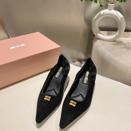 POINTED-TOE MID HEEL PUMPS IN BLACK SUEDE