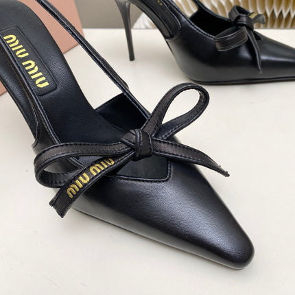 MIUMIU 26S SLINGBACK PUMPS 105MM IN BLACK CALFSKIN WITH BOW