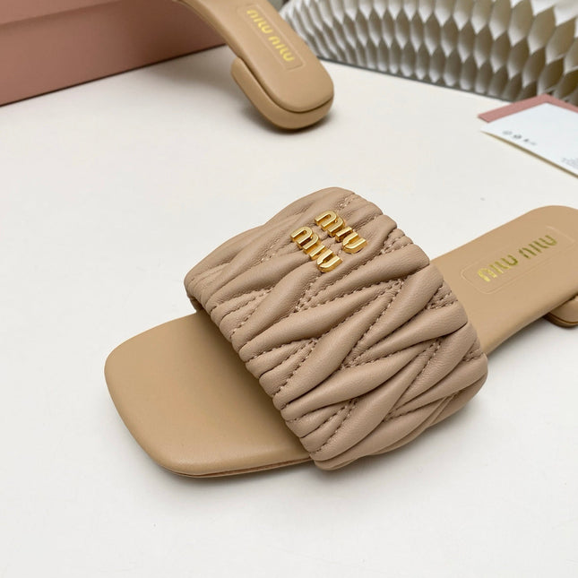 MIUMIU 26S MATELASSE SLIDES IN BEIGE CALFSKIN