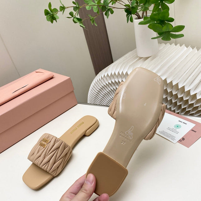MIUMIU 26S MATELASSE SLIDES IN BEIGE CALFSKIN