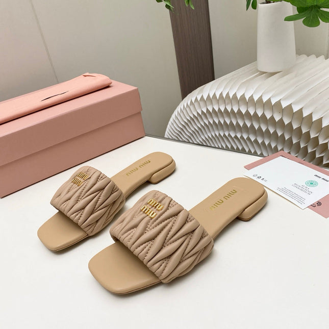 MIUMIU 26S MATELASSE SLIDES IN BEIGE CALFSKIN